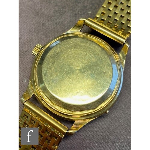 234 - A gentleman's 18ct gold Piaget automatic wrist watch, batons and date facility to a circular silvere... 