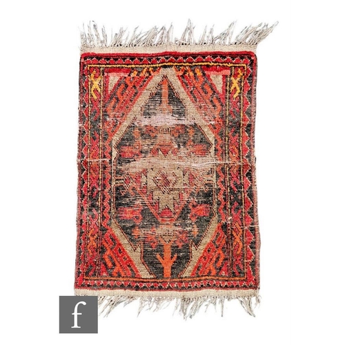 522 - A Soumac flat weave rug, central red ground within a yellow and blue bordered leaf design, 244cm x 1... 