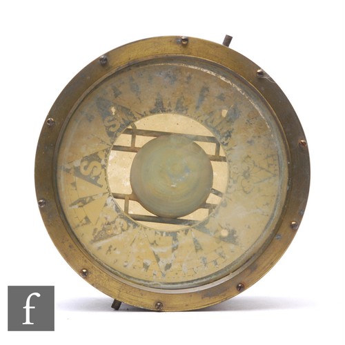 219 - An early 20th Century brass cased ships gimbal compass, with screw down bezel and painted dial, lack... 