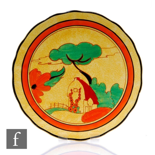 138 - A Clarice Cliff Red Roofs Cafe Au Lait (Yellow) wave edged plaque circa 1931, hand painted with a st... 