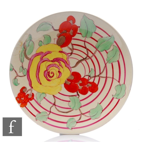 143 - A Clarice Cliff Amberose circular dish form plate circa 1933, hand painted with flowers and foliage ... 