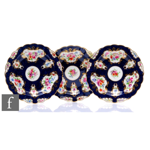 185 - Three early 20th Century Royal Worcester cabinet plates decorated by Phillips, with hand painted flo... 