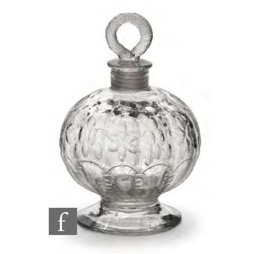 An 18th Century glass decanter circa 1750, German or Bohemian, of footed globe form, optic moulded ribs and cut decoration, with screw stopper with ring finial, height 17cm.