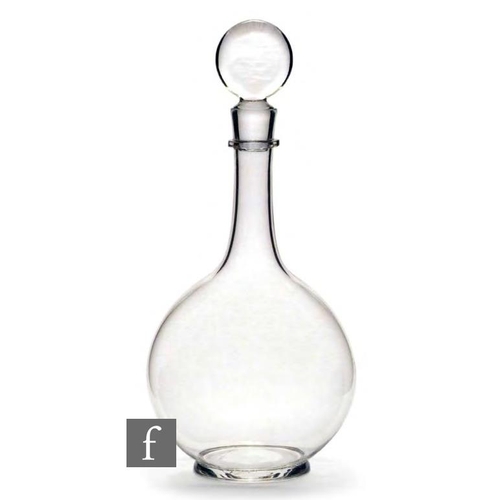 8231 - An Arts and Crafts glass decanter circa 1900, of compressed ovoid form with applied foot and neck ri... 