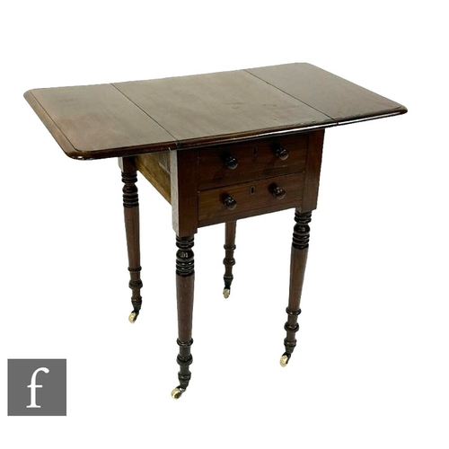 494 - A small mid 19th Century mahogany drop flap work table, fitted with two small drawers on ring turned... 