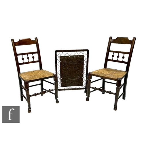 496 - A pair of late 19th to early 20th Century Lancastrian rush seat standard chairs and an oak framed fi... 