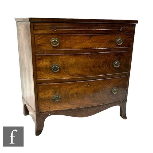 497 - A 19th Century mahogany crossbanded bowfront dressing chest of three graduated drawers below a brush... 