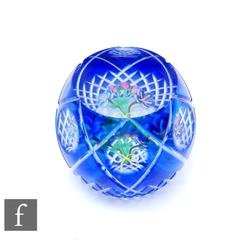 864 - A later 20th Century Perthshire glass paperweight designed by Neil Drysdale, internally decorated wi... 