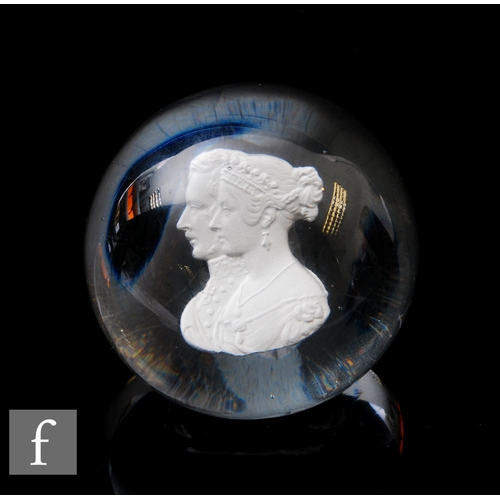 900 - An mid 19th Century Clichy clear crystal glass paperweight, internally decorated with a portrait of ... 