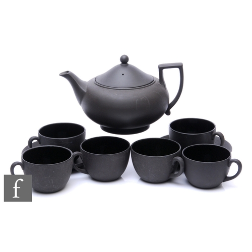 104 - A Wedgwood black basalt tea service, comprising teapot, six teacups and two saucers, impressed marks... 