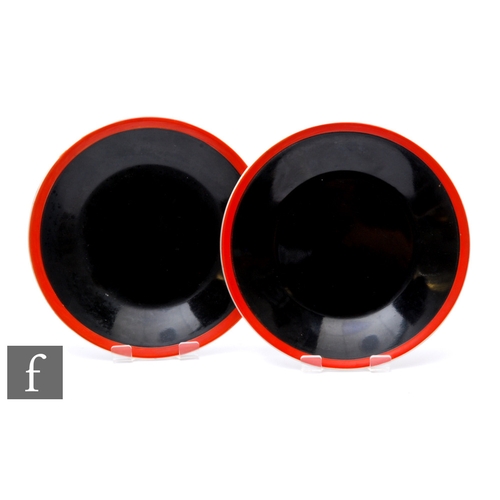 157 - A pair of Clarice Cliff Yoo-Hoo side plates circa 1930, each with a red enamel band over black glaze... 