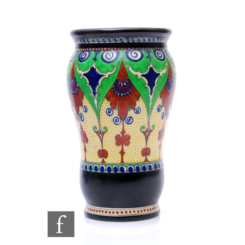 178 - A large 1930s Gouda Ware vase of footed swollen ovoid form hand enamelled with stylised foliate scro... 