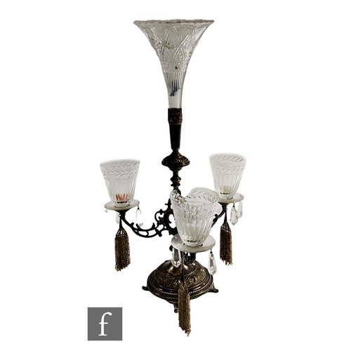 212 - A Edwardian plated three branch epergne, the central flute above three sconced goblets, drop lustres... 