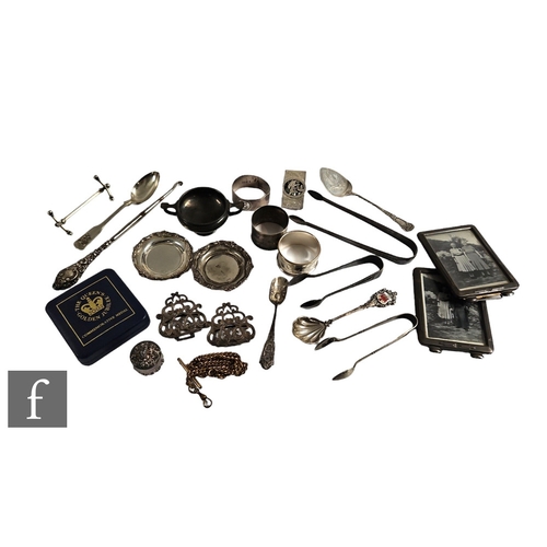 238 - Assorted silver items to include frames, napkin rings, spoons, thimbles, fobs, badges etc. (qty)