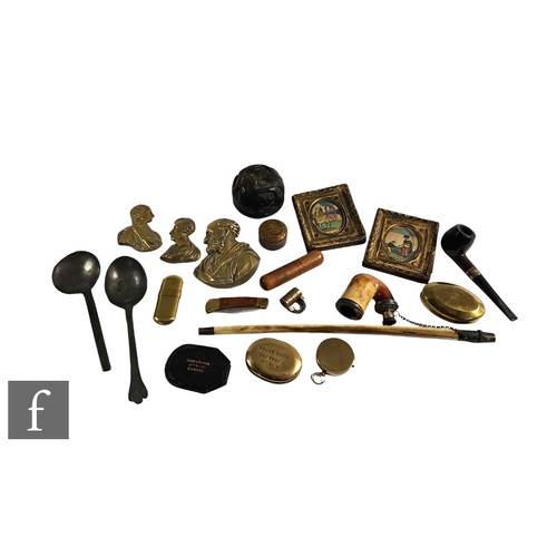 241 - A collection of curios including pipes, snuff boxes, brass mounts, two early pewter spoons and a car... 