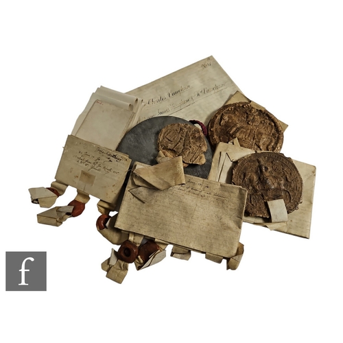 250 - A small collection of early 17th Century indentures and transcripts and a later indenture with attac... 