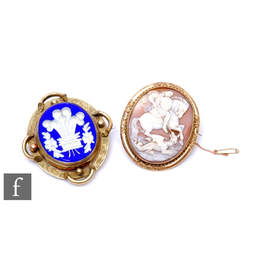 268 - Two 19th Century brooches, to include a yellow metal and shell carved cameo brooch depicting St. Geo... 