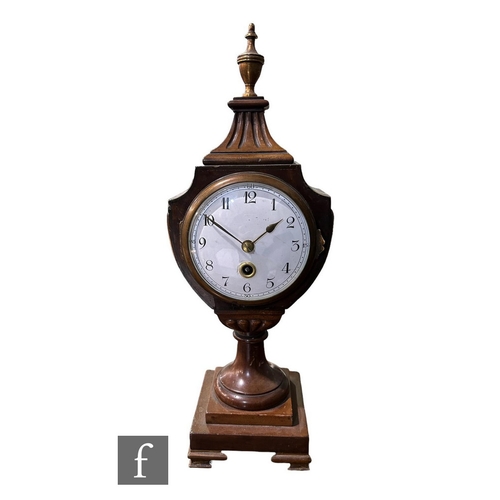 315 - An Edwardian mahogany mantle clock in the Regency style, white circular dial with Arabic numerals, i... 