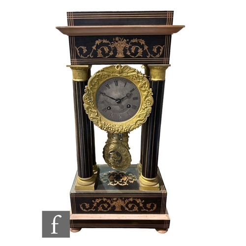 316 - A 19th Century marquetry inlaid Portico mantle clock, the silvered dial and movement suspended in th... 