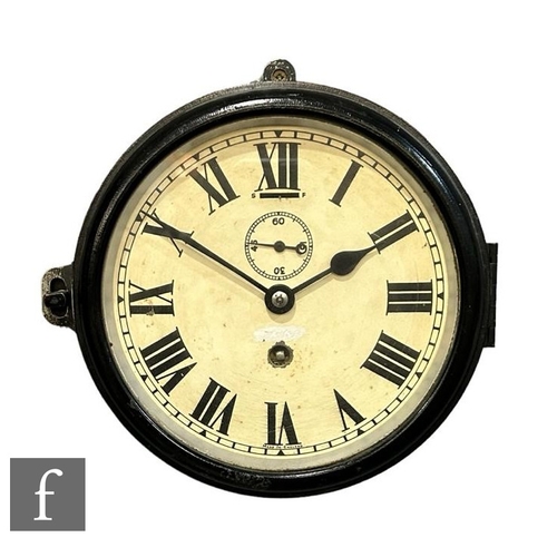 318 - A Smiths circular wall clock in black cast case and frame, single wind and subsidiary seconds dial, ... 