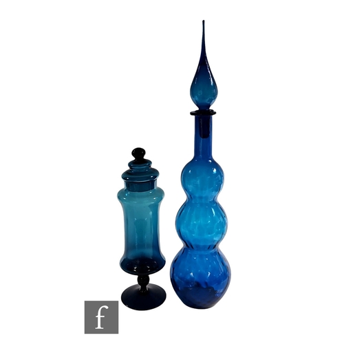 795 - A mid 20th Century Italian Empoli glass decanter of triple gourd form with optic ribbing and tall co... 