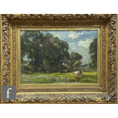 426 - OWEN BOWEN (1873–1967) - 'Goathland' -  Cattle in a sunlit meadow, oil on canvas, signed and dated 1... 