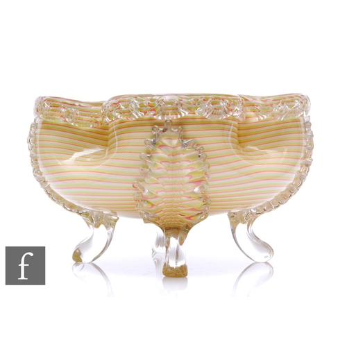 612 - A large late 19th Century Stourbridge glass bowl, the circular body with dimple knocked sides and qu... 