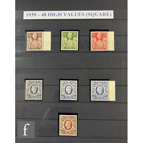 347 - A blue stamp album containing a collection of George VI issues, including high values and booklets e... 