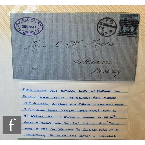 348 - A blue album containing a collection of 19th Century postal covers, postal entries including pre-sta... 