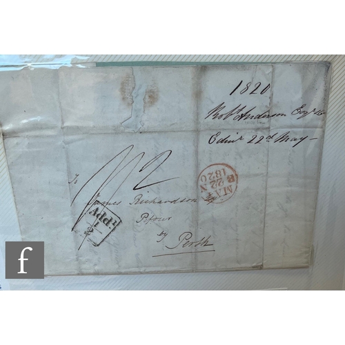 348 - A blue album containing a collection of 19th Century postal covers, postal entries including pre-sta... 