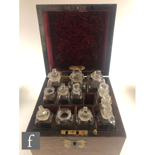 209 - A 19th Century square rosewood apothecary box, the hinged lid opening to reveal an arrangement of tw... 