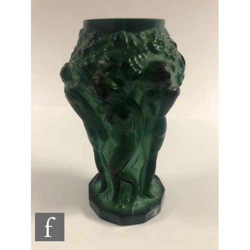 703 - A 1930s Czech Art Deco Malachite glass vase heavily relief moulded with a freize of naked females am... 