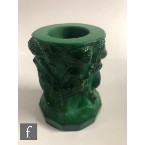 703 - A 1930s Czech Art Deco Malachite glass vase heavily relief moulded with a freize of naked females am... 