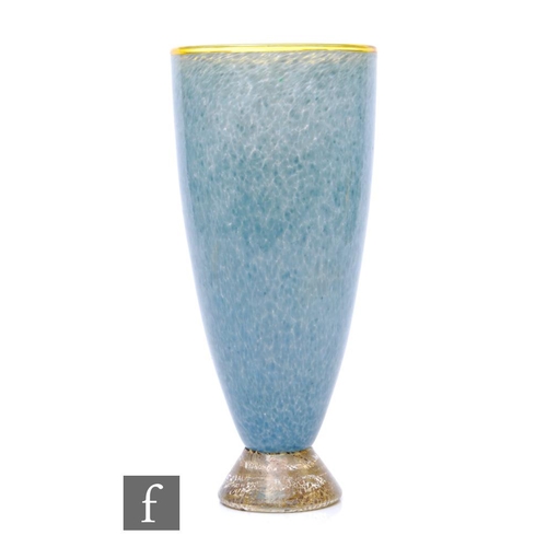 908 - A Phoenix Glass Company vase of flared form in mottled blue with applied yellow rim and foot decorat... 