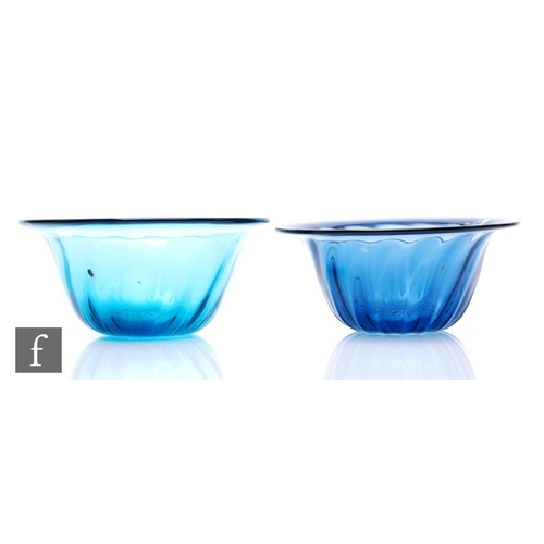 909 - A pair of later 20th Century studio glass bowls by Anthony Stern, of fluted flared form in a mid blu... 