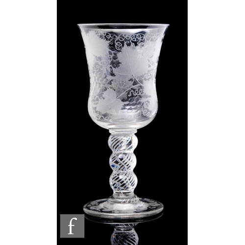 925 - A 19th Century goblet, the large waisted bell form bowl engraved with a fruiting vine above a triple... 