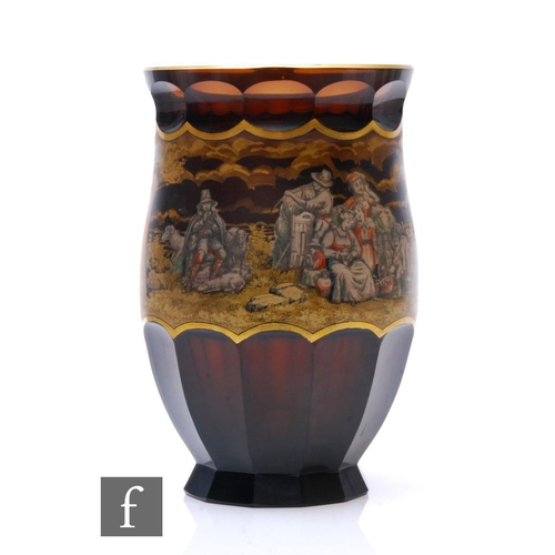 937 - An early 20th Century glass vase by Haida, of footed ovoid form with flared rim, the deep amber body... 