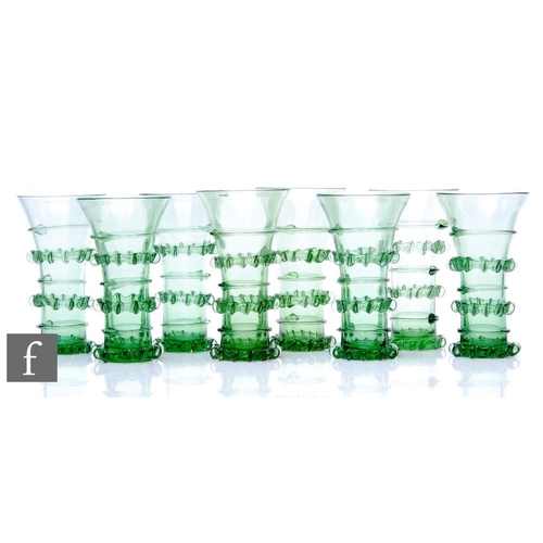 940 - A set of contemporary hand blown reproduction green drinking glasses in the style of a German Mediev... 