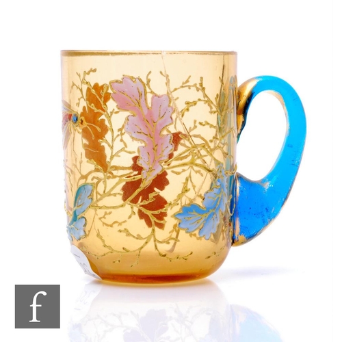 947 - A late 19th Century Moser glass punch cup, the amber body enamel and gilt decorated with leaves and ... 