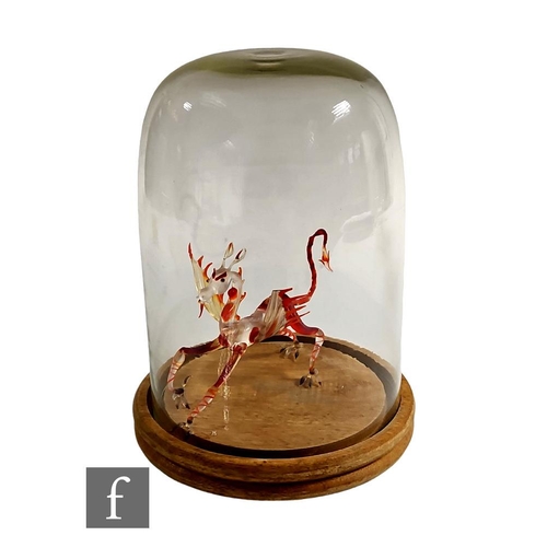 949 - A late 20th Century lamp work figure of a Welsh Dragon in red and clear crystal glass, mounted to a ... 