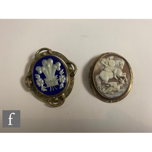 268 - Two 19th Century brooches, to include a yellow metal and shell carved cameo brooch depicting St. Geo... 