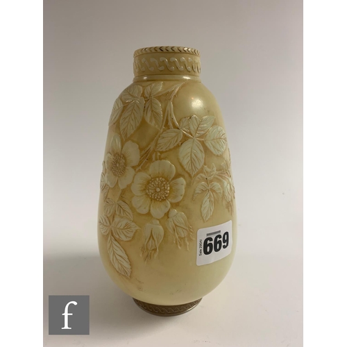 669 - A late 19th Century Thomas Webb & Sons Ivory cameo glass vase of footed tapered ovoid form with ... 