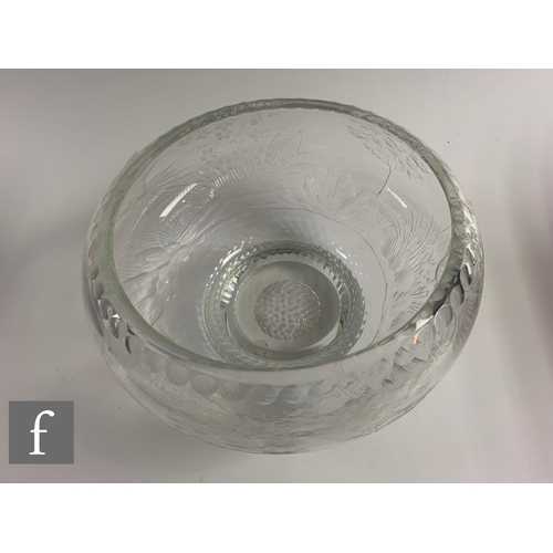 709 - A large early 20th Century Thomas Webb & Sons clear crystal glass bowl of footed ovoid form with... 