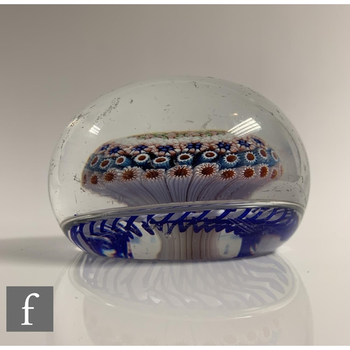 903 - A classic period Baccarat mushroom torsade paperweight, the central mushroom with concentric ruffle,... 