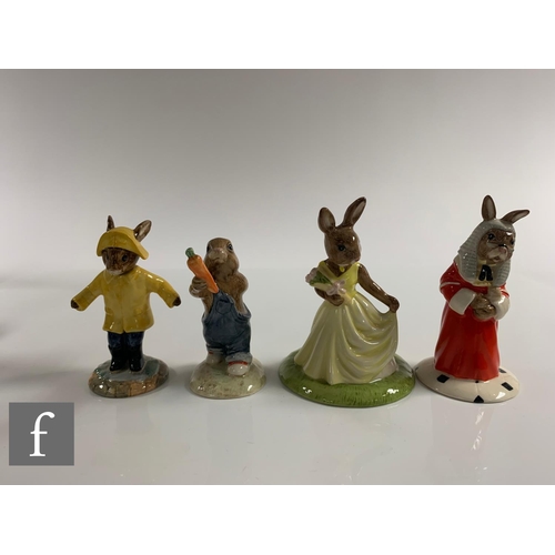 96 - A collection of twenty four Royal Doulton Bunnykins figures, to include Boy Skater Bunnykins, Bathti... 