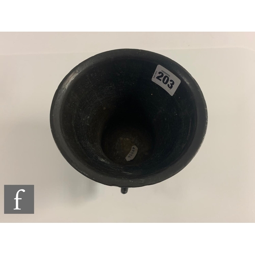 203 - A small continental bronze pestle and mortar with bands of decoration with 'LOF GODT VAN AL 1662', d... 