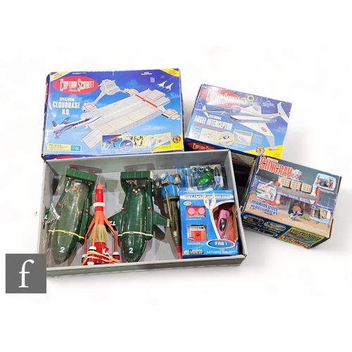 64 - A collection of assorted Gerry Anderson related toys, to include a Matchbox Stingray Marineville Hea... 