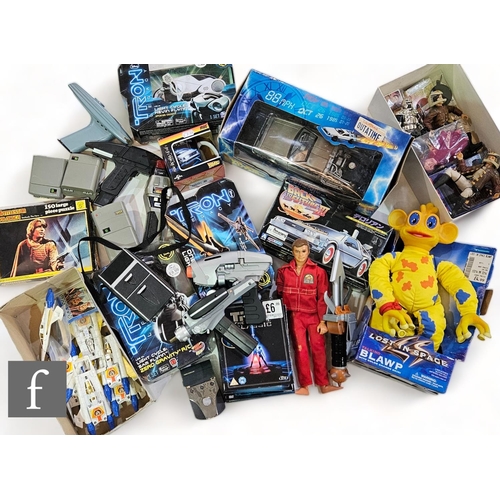 69 - A collection of assorted sci-fi and space related toys and merchandise, to include Tron, Robocop, Ba... 