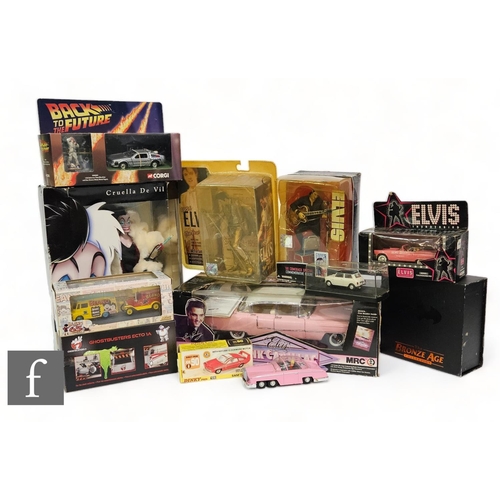 73 - A collection of assorted television and film related toys, to include a Hot Wheels Ghostbusters ECTO... 