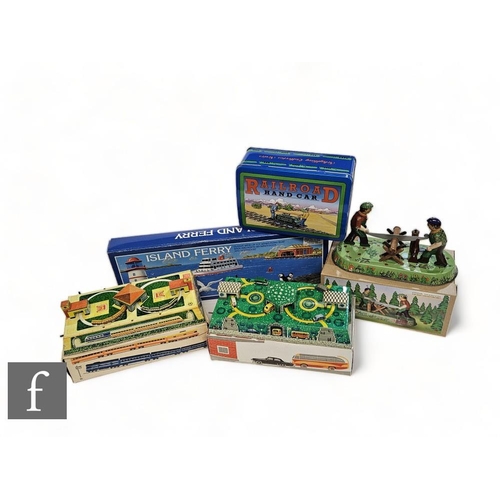 83 - A collection of USSR and vintage style tinplate toys, Schylling Island Ferry, Schylling Railroad Han... 